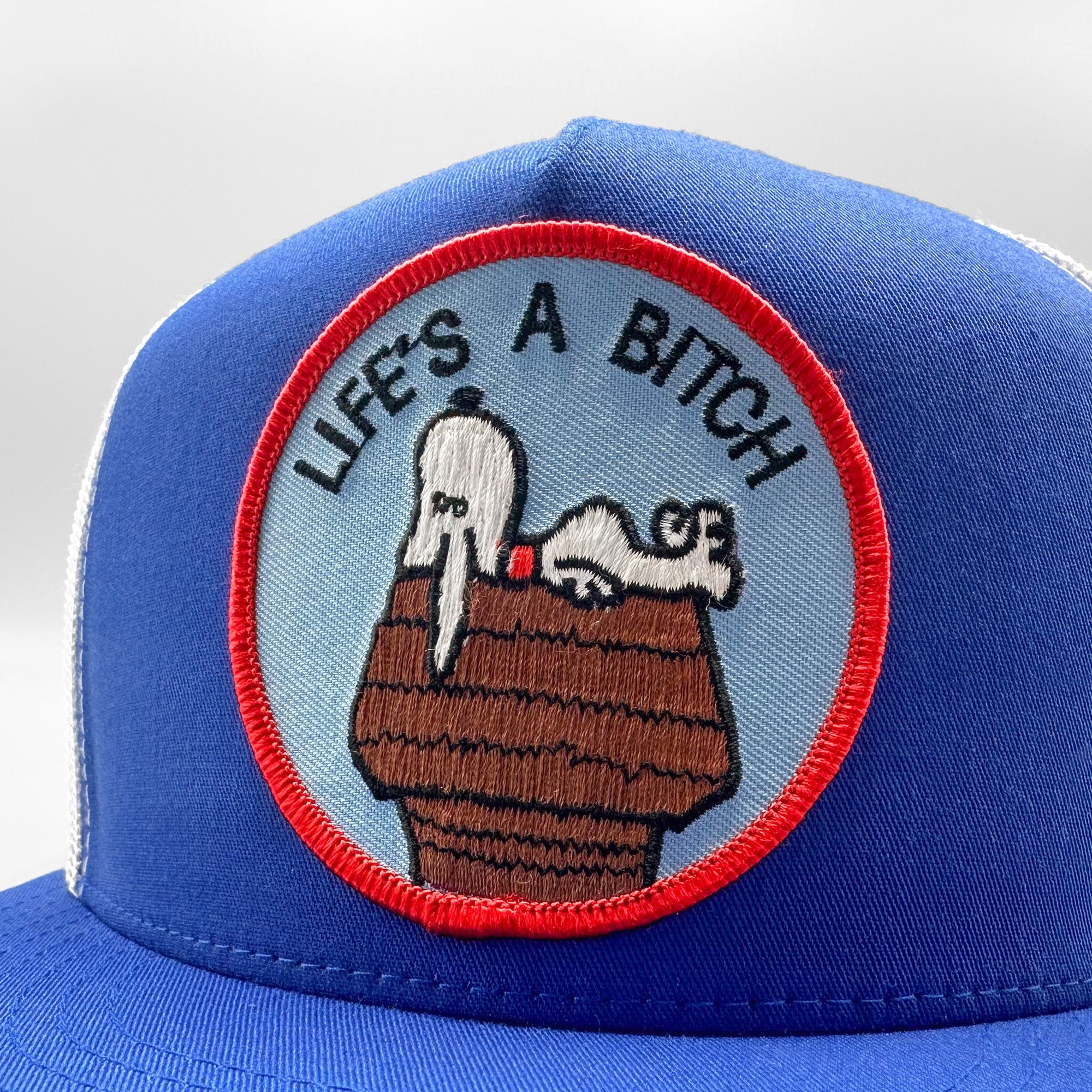 Life's a Bitch Trucker Hat - 0