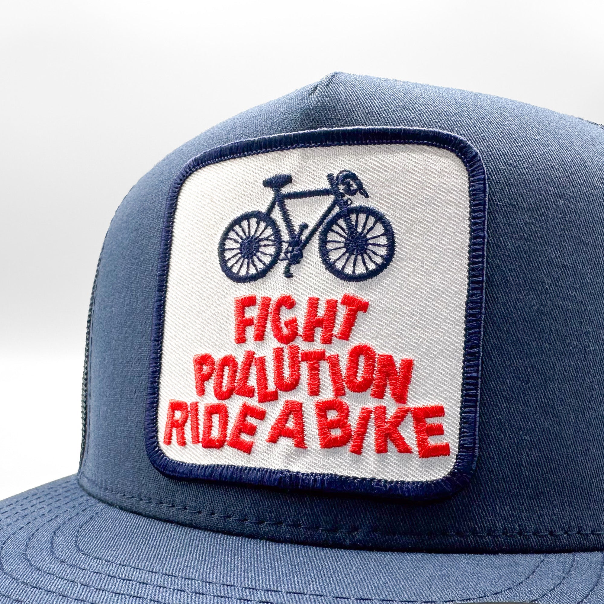 Fight Pollution Ride a Bike Trucker Hat - 0